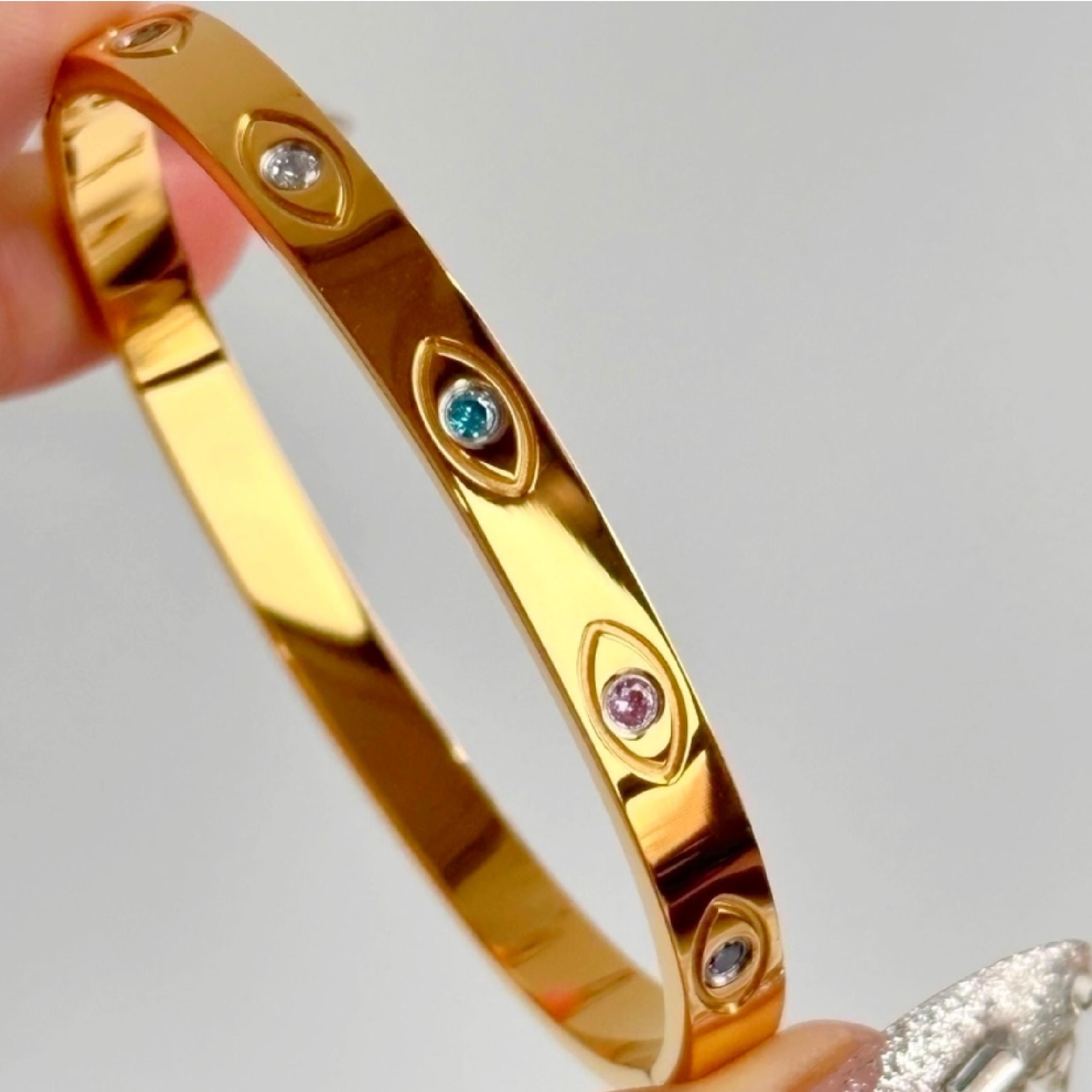 Gold evil eye bangle