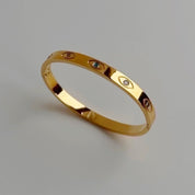 Gold evil eye bangle