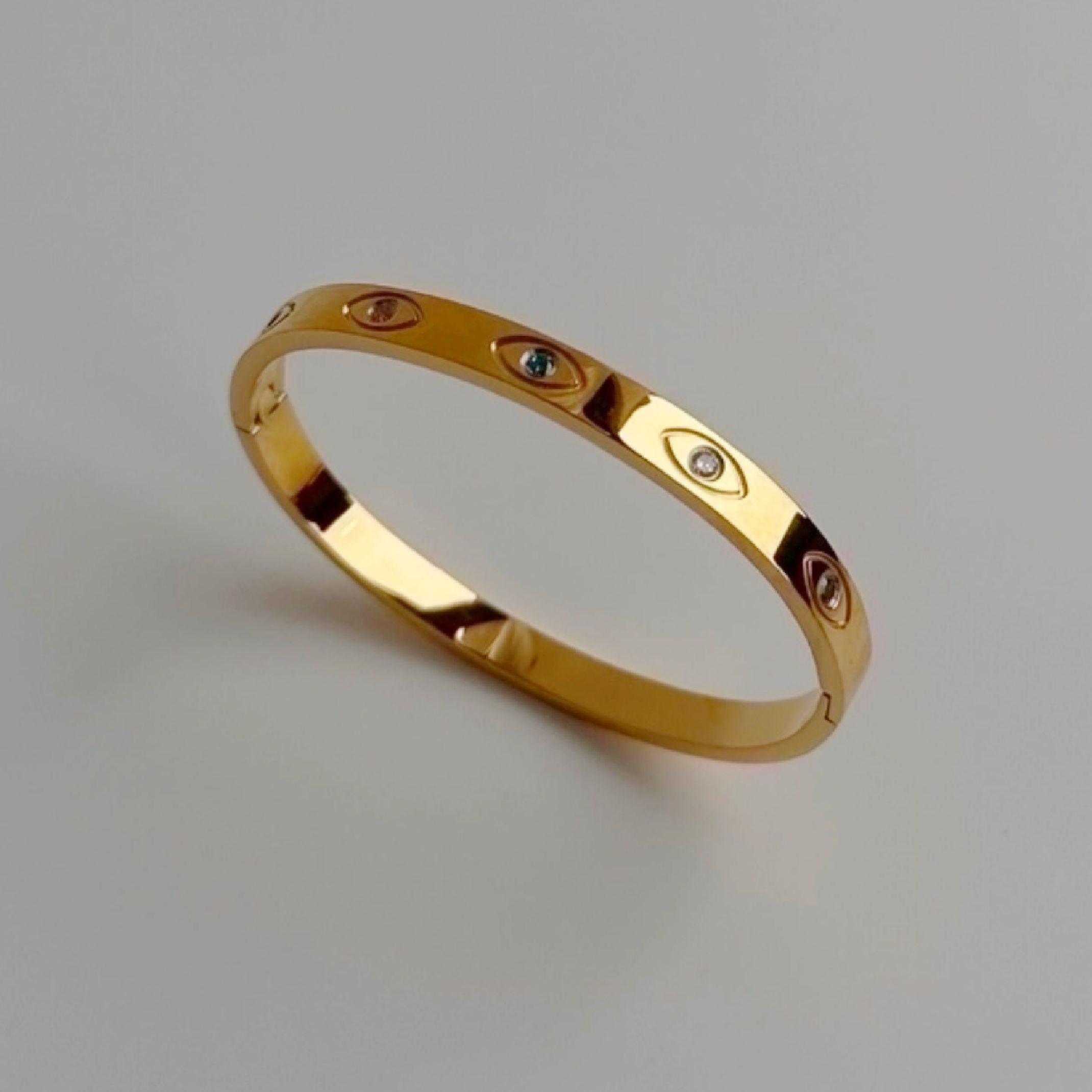 Gold evil eye bangle