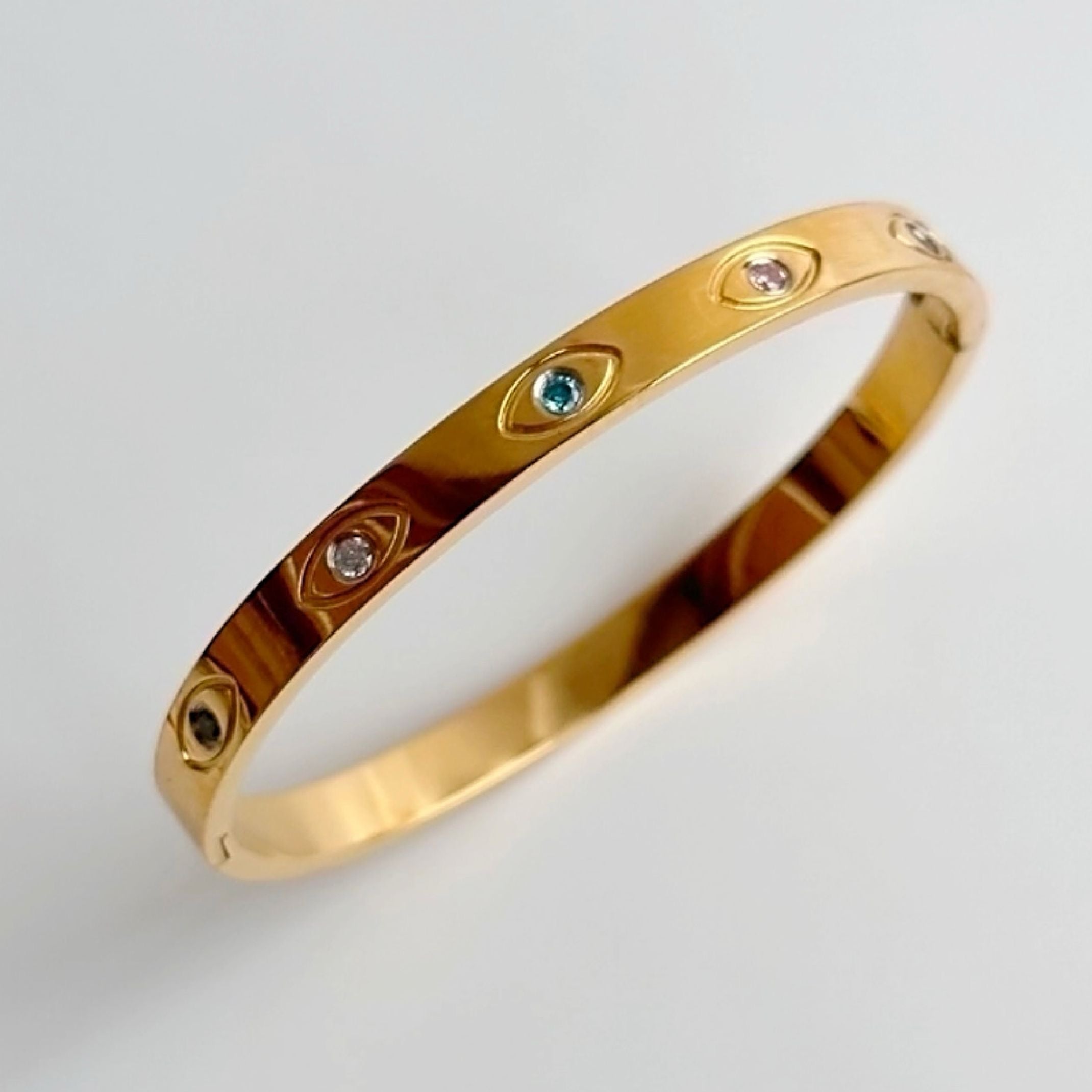 Gold evil eye bangle