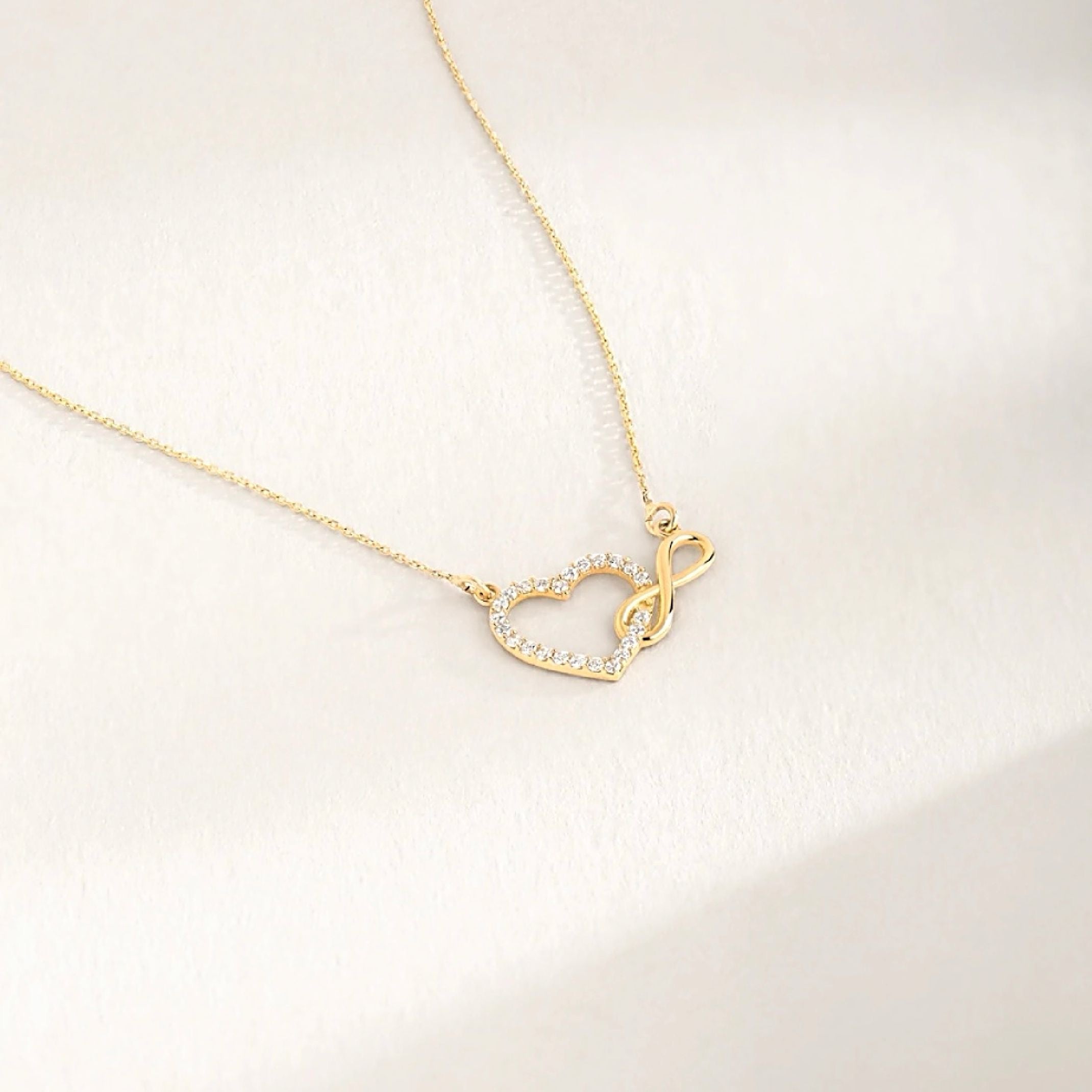 Gold infinity heart necklace
