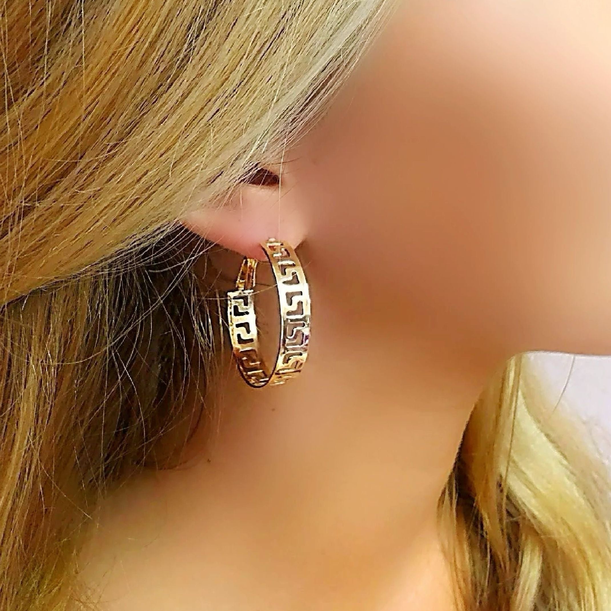 Gold cut out hoop earrings 