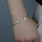 Gold heart bangle