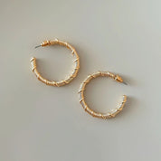 Gold twist hoop earrings 