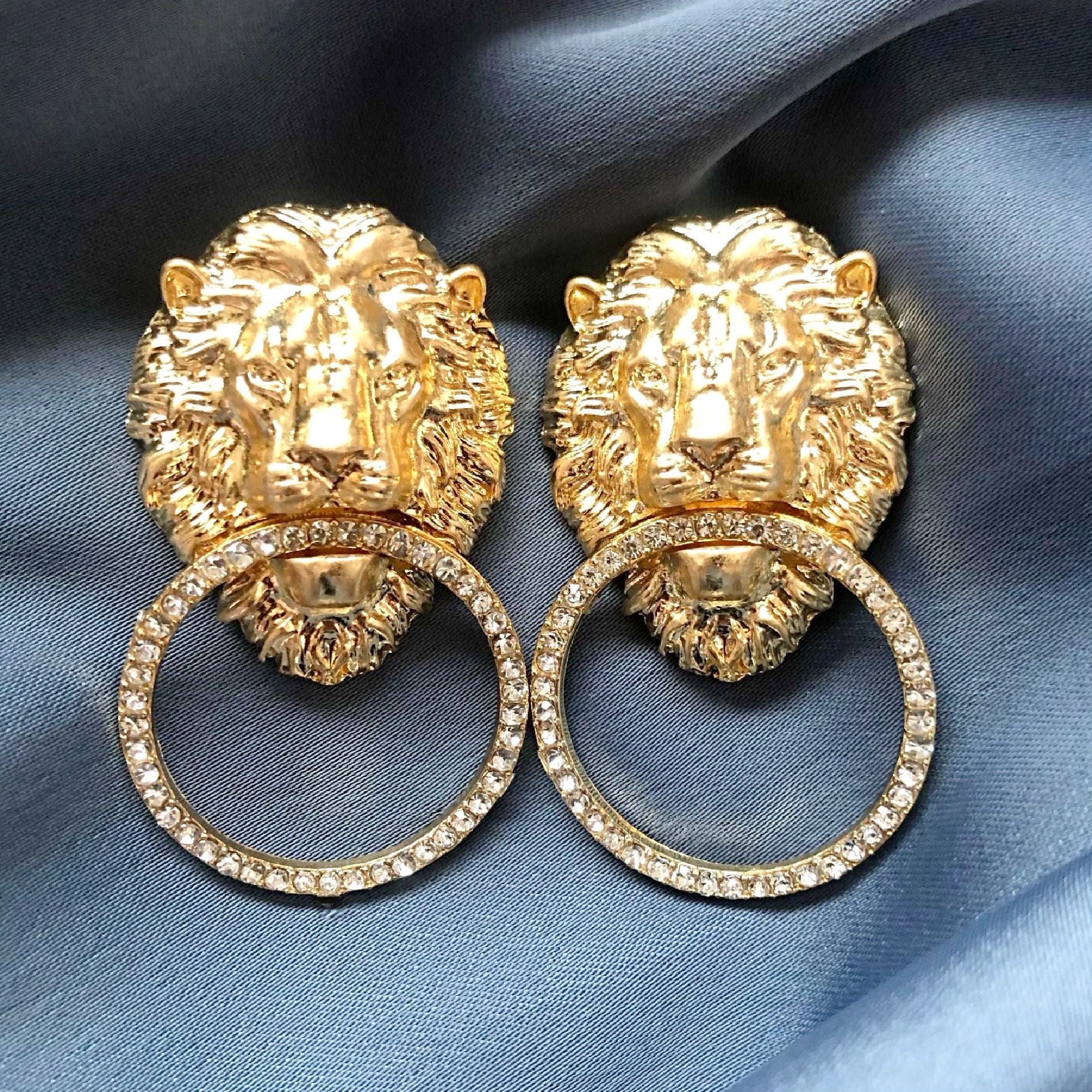 Diamanté lion head earrings