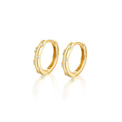 Diamond huggie earrings gold