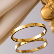 Gold v bangle