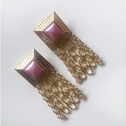 Pink statement earrings