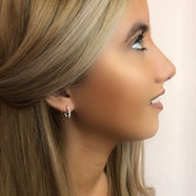 Gold crystal huggie earrings