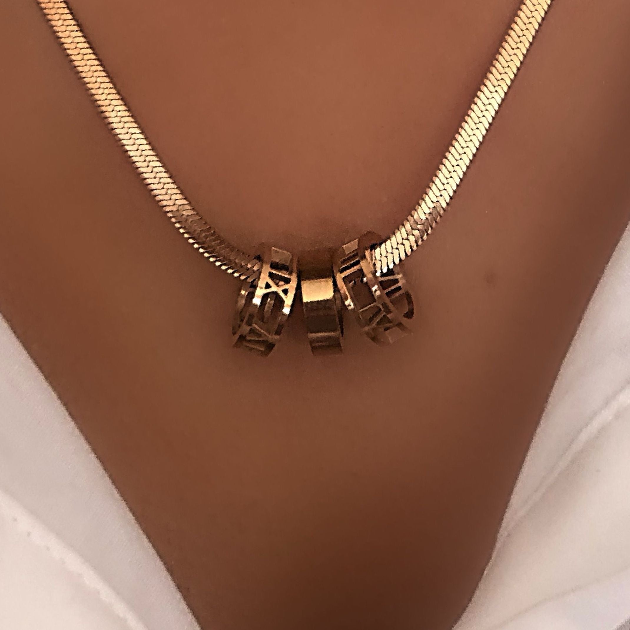 Rose gold snakeskin love ring necklace 