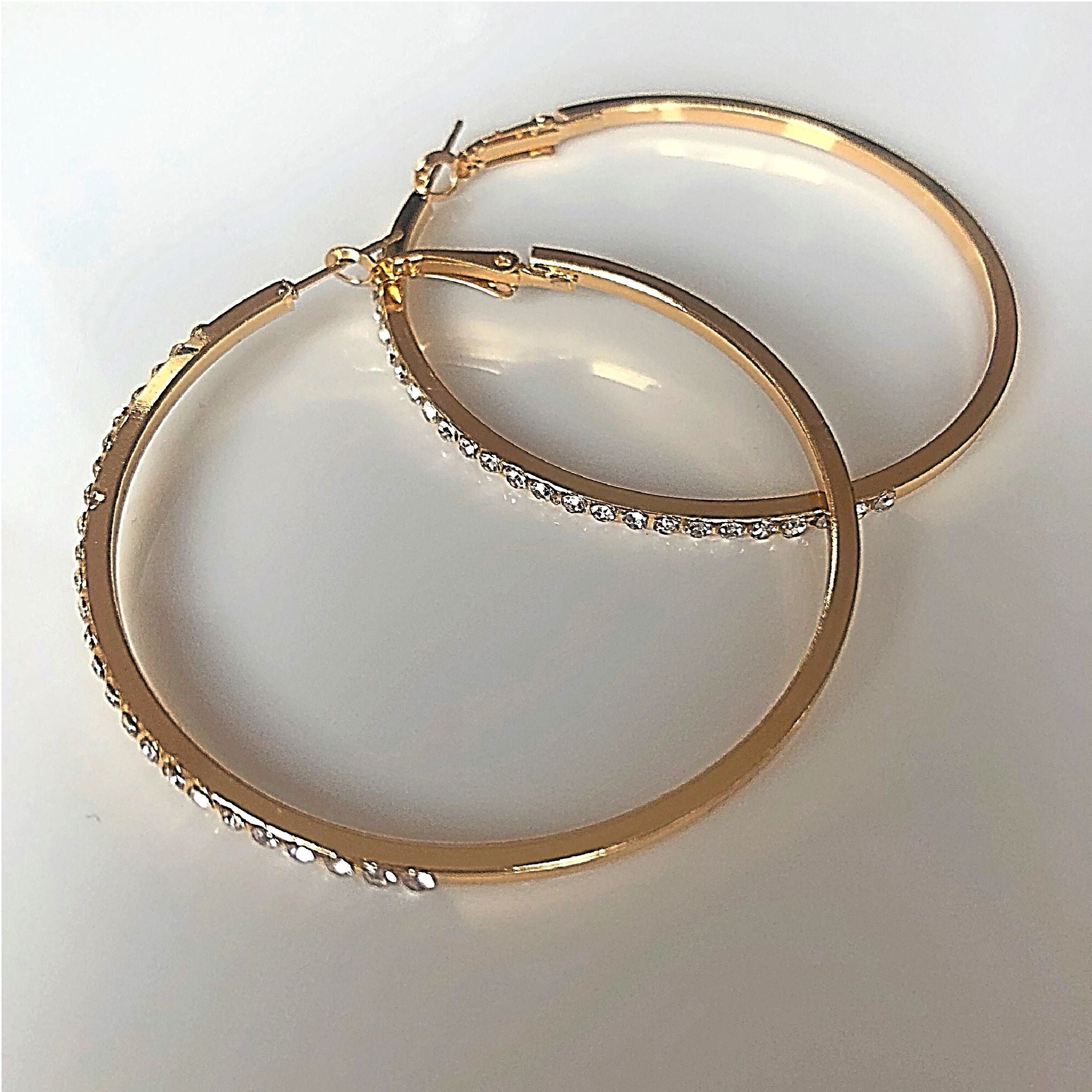 Large gold and rhinestone hoop earrings 