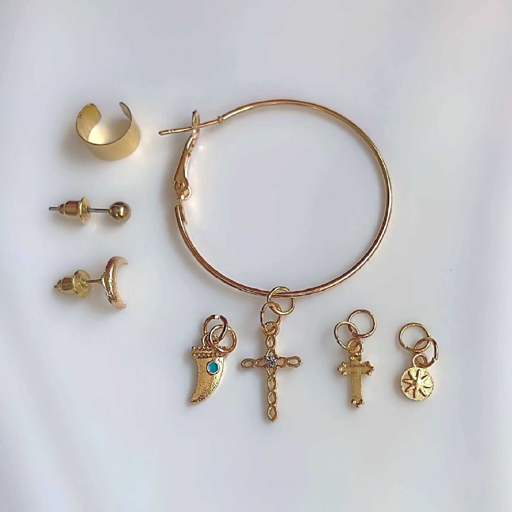 Gold charm earring stack 