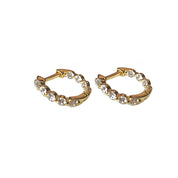 Gold crystal huggie earrings