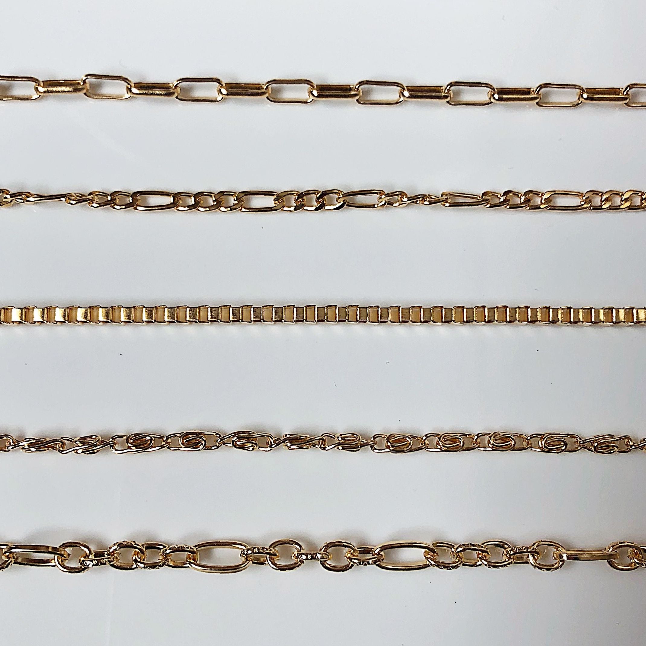 5 gold chain link bracelets 