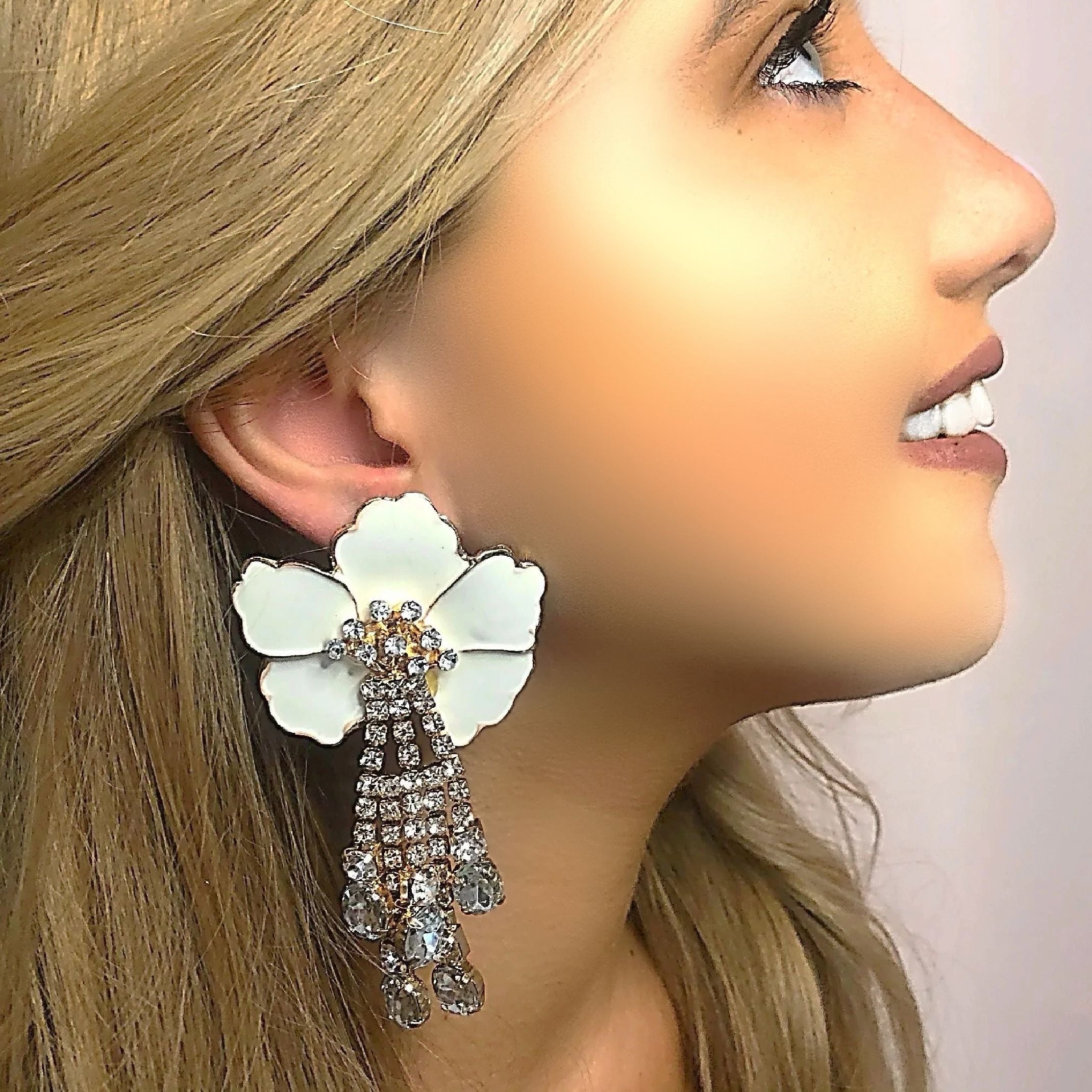 White rhinestone flower earrings 