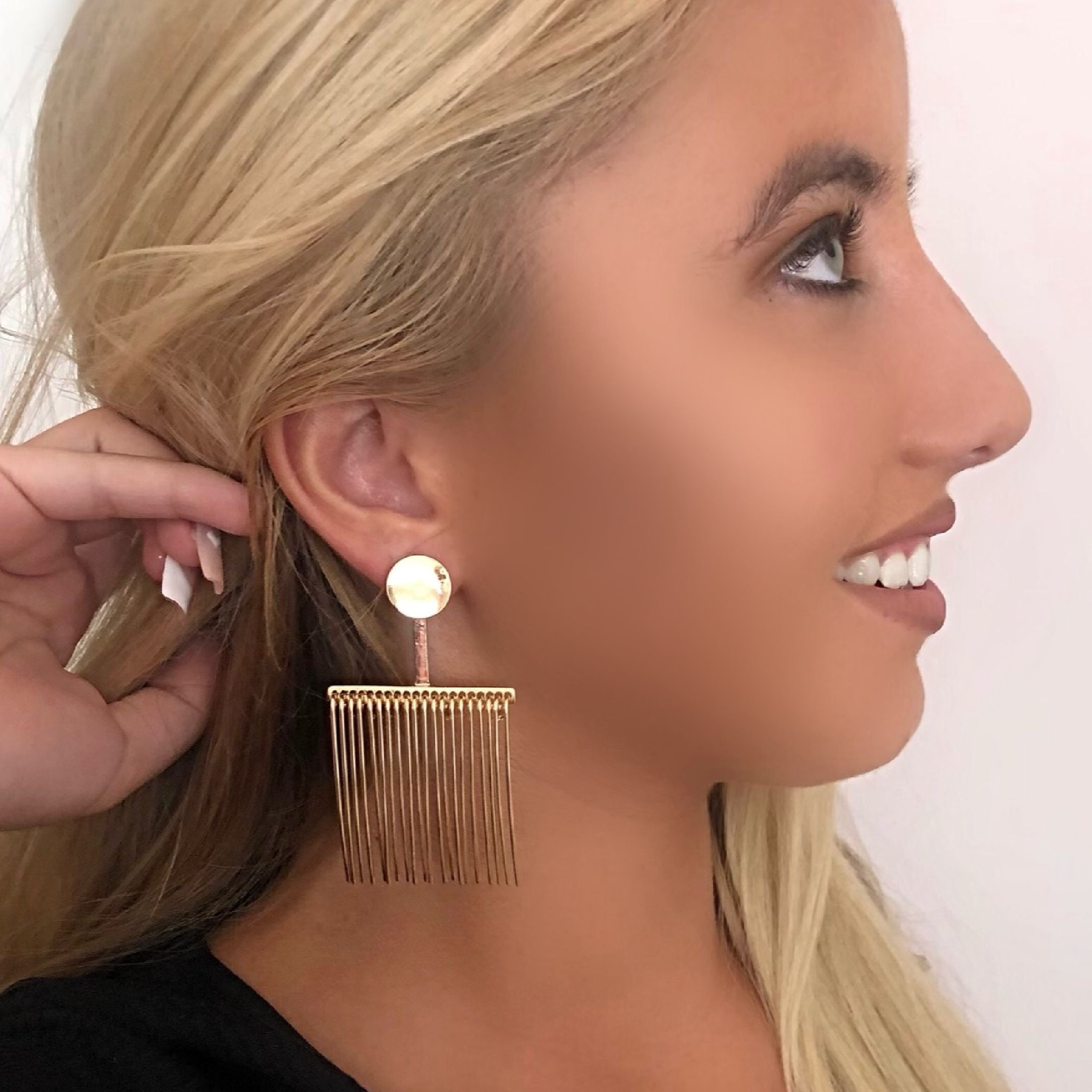 Gold comb back earrings 