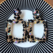 Black statement earrings
