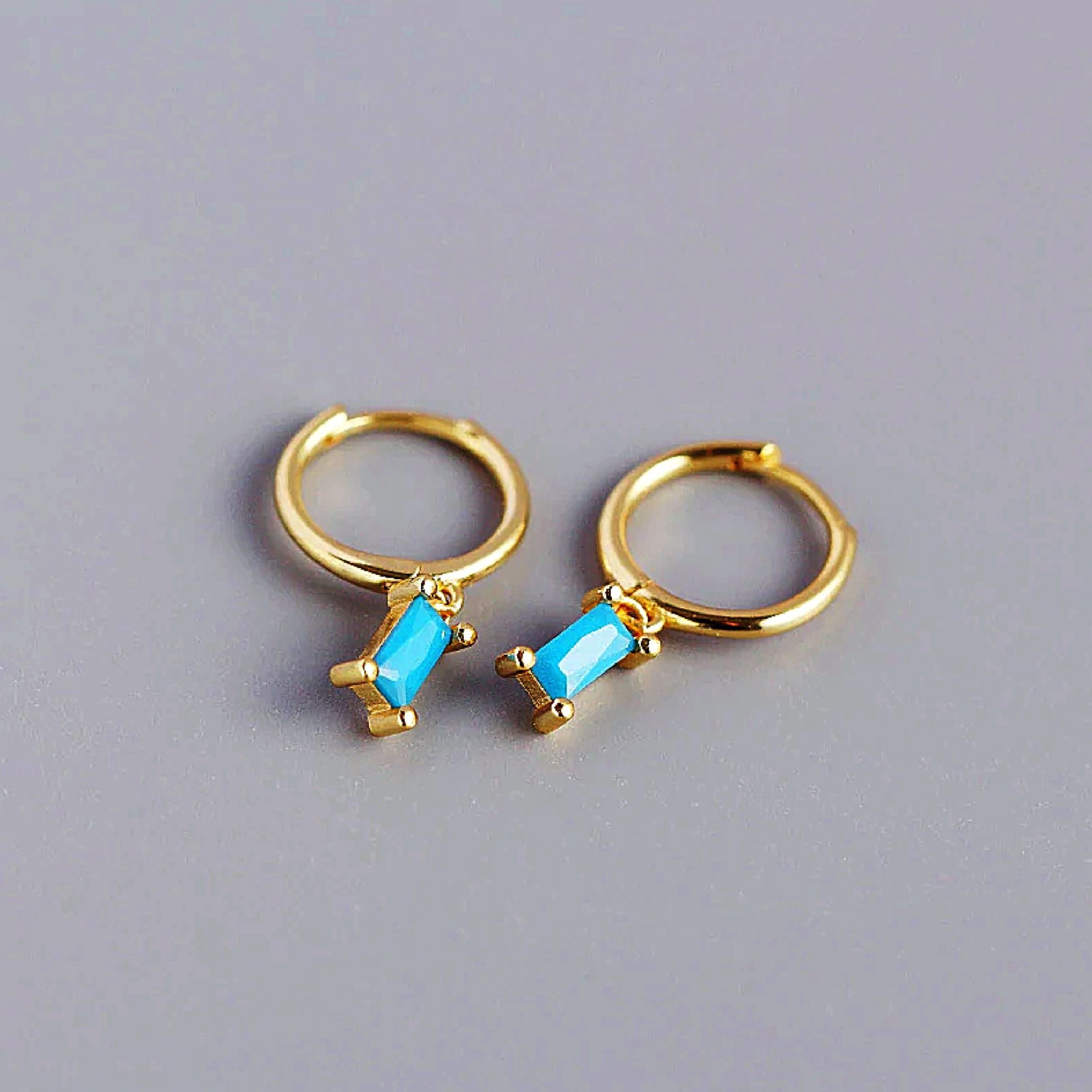 Blue gem huggie earrings