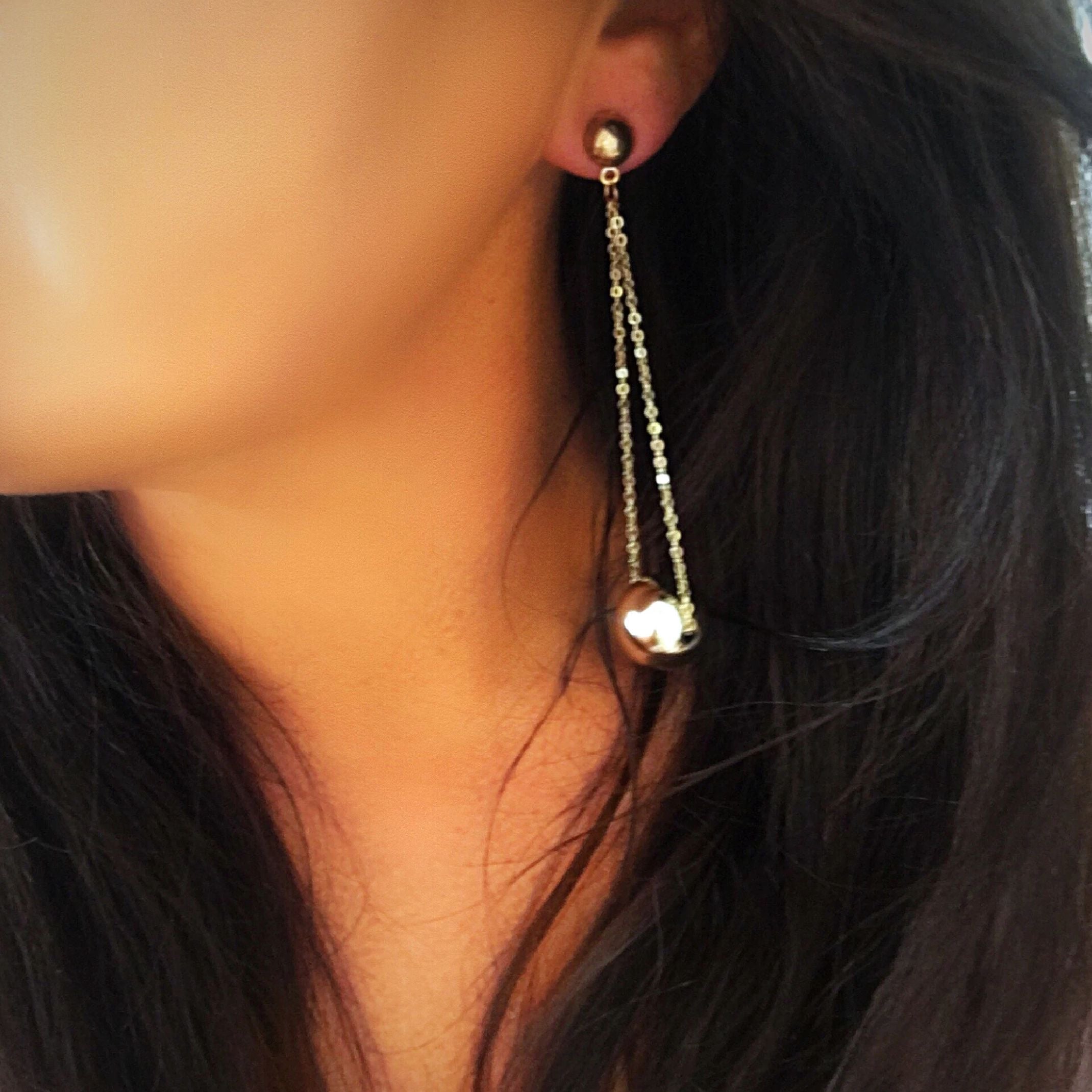 Gold statement dangle earrings 