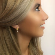 Gold diamond huggie earrings