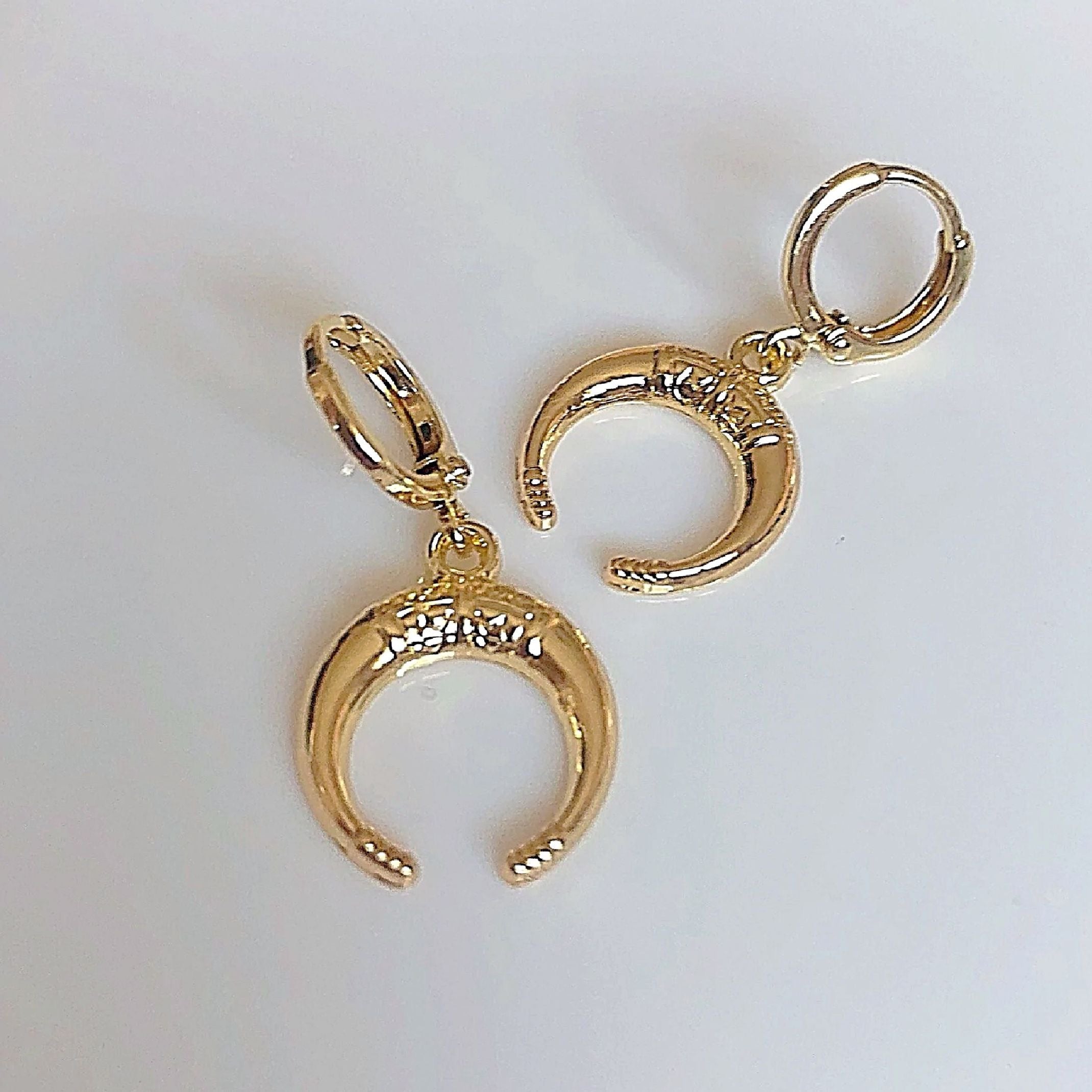 Gold horseshoe huggie earrings 