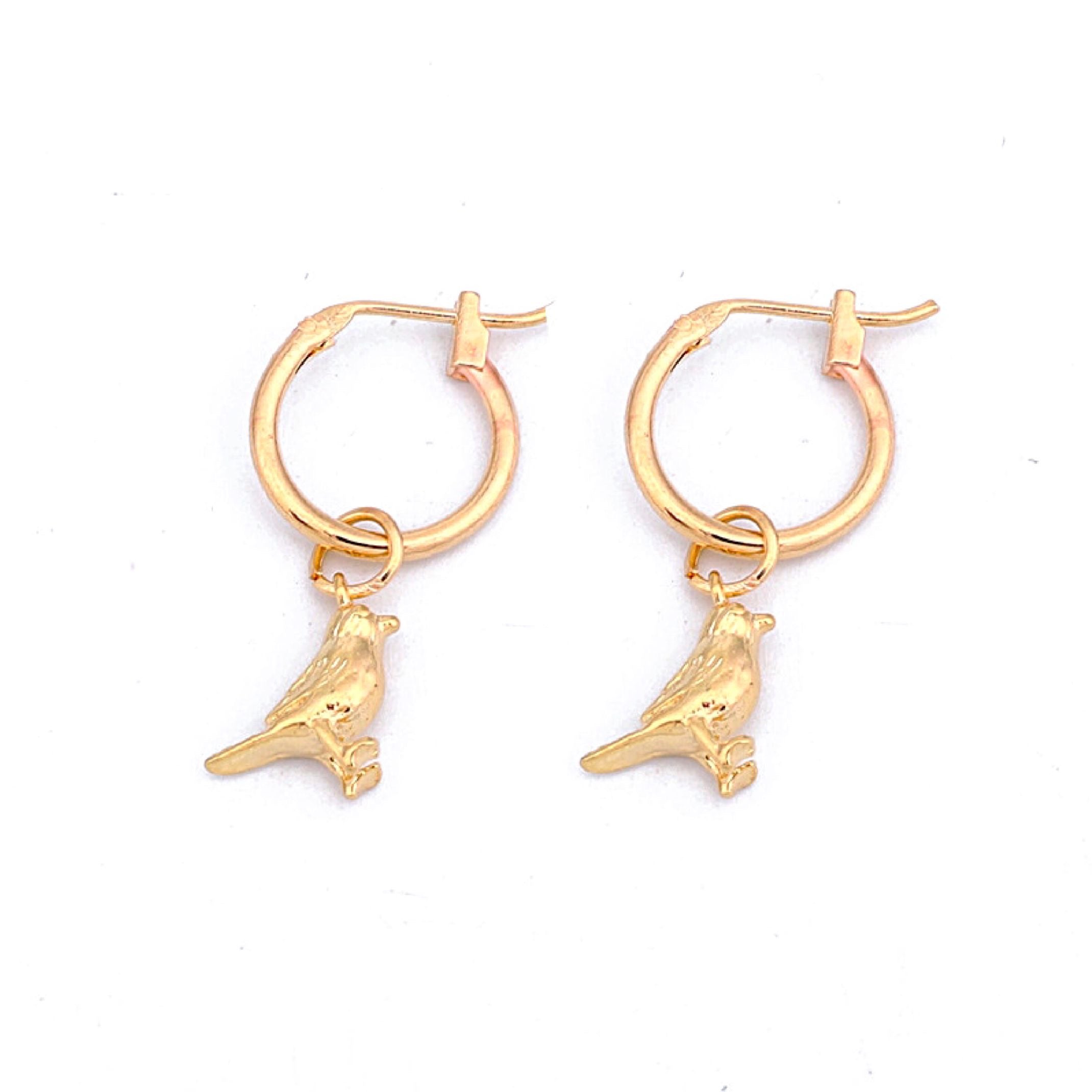 Gold bird charm earrings 