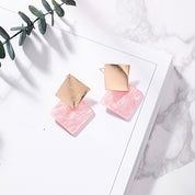 Pink and gold earrings