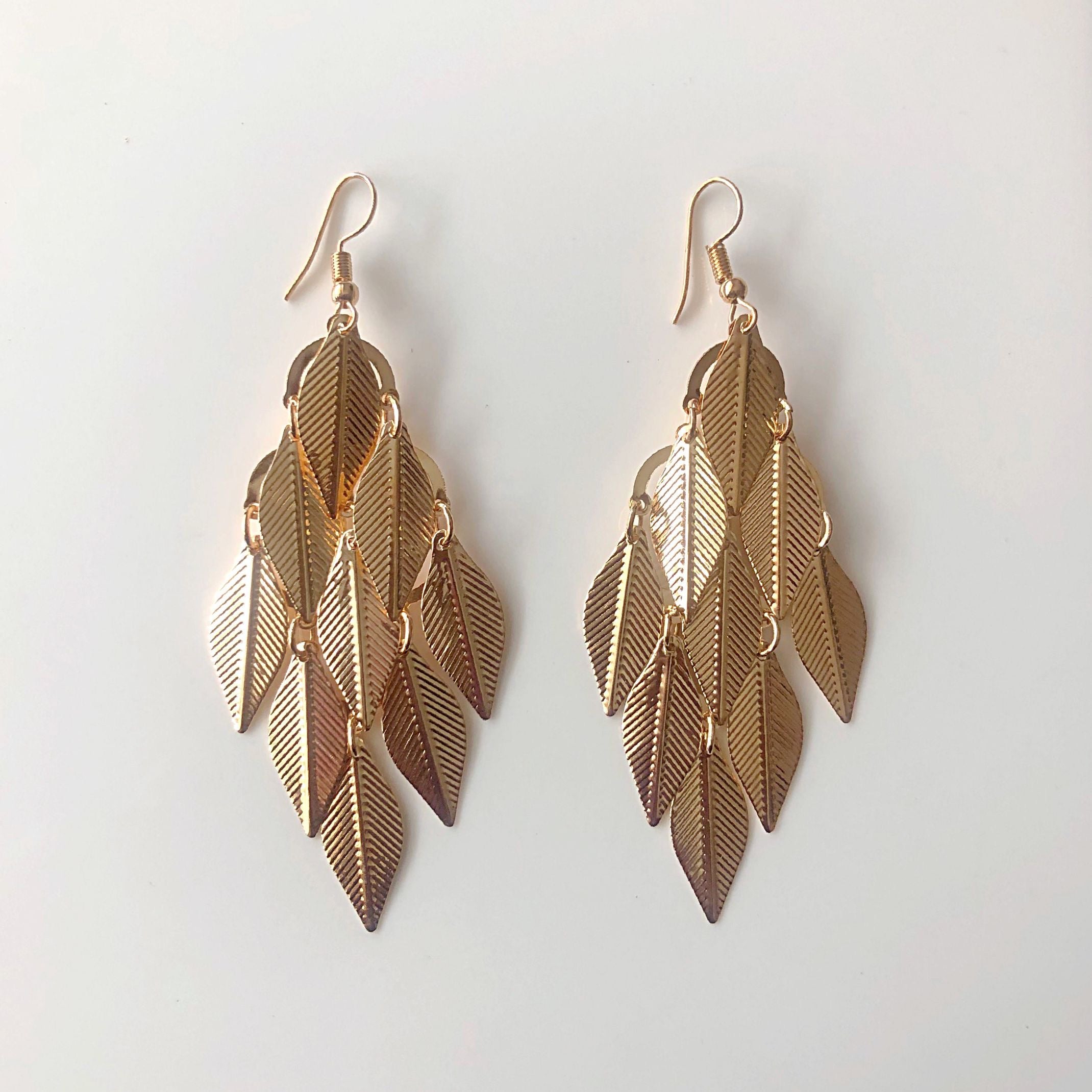 Gold leaf dangle earrings 