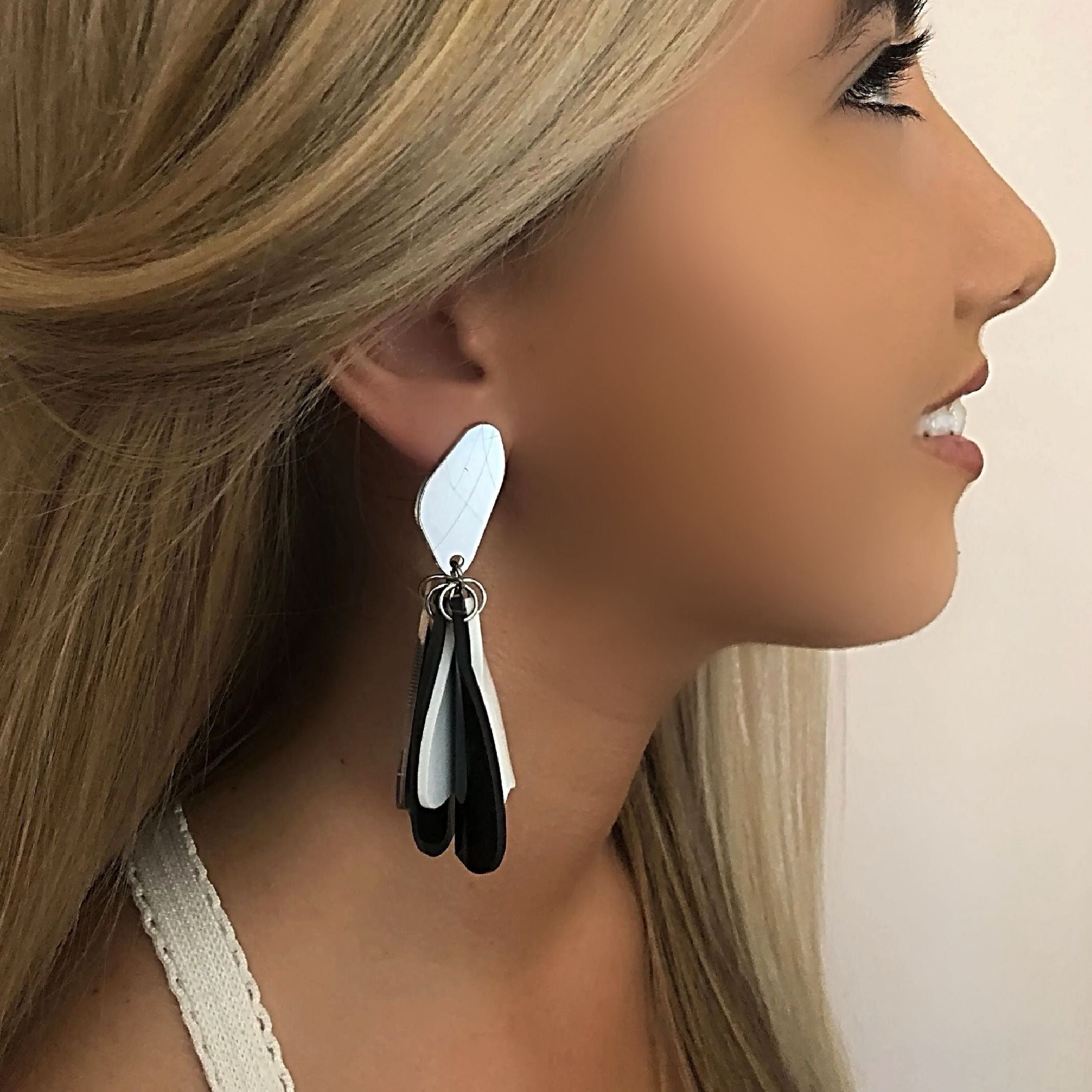 Black mismatched earrings 
