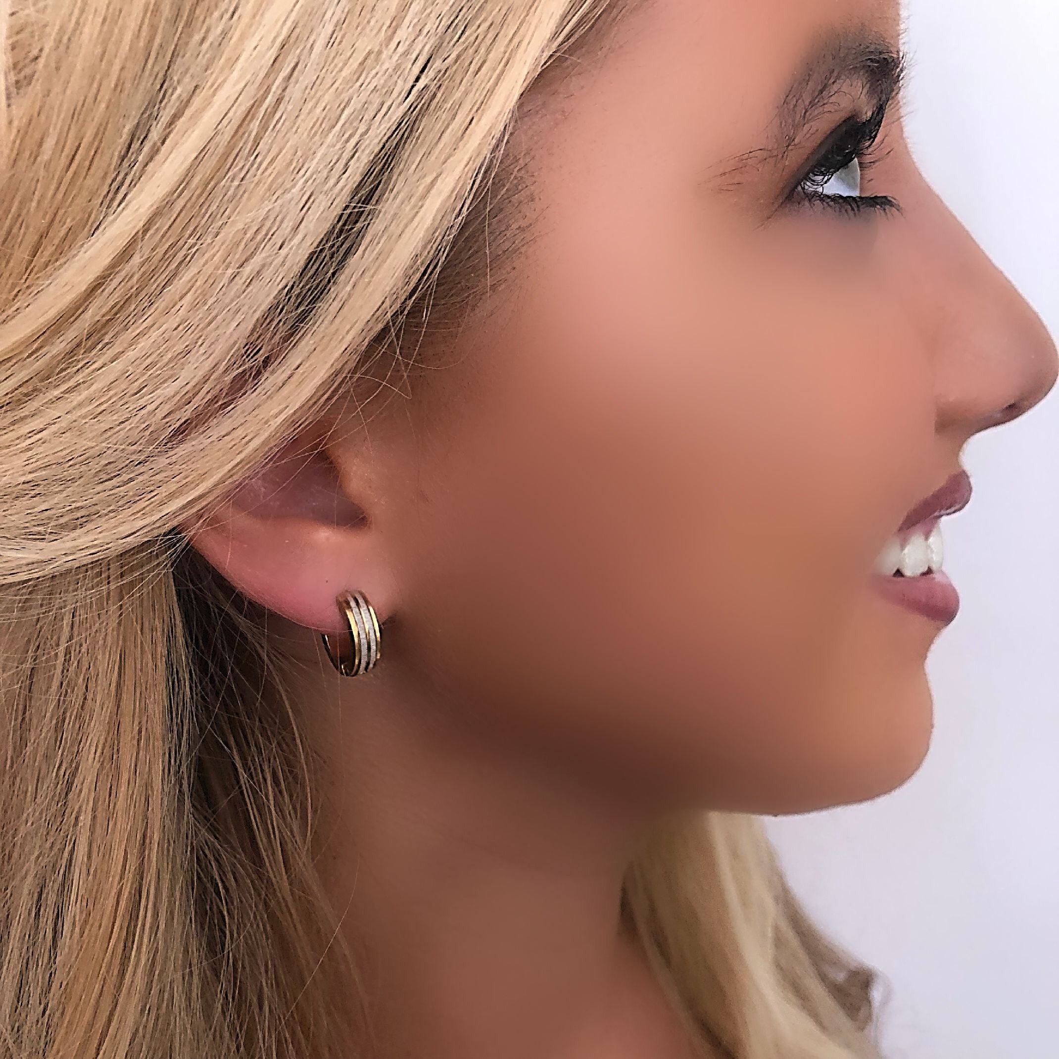 Gold and silver stripe huggie earrings 