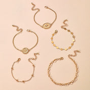 Gold pendant bracelet set