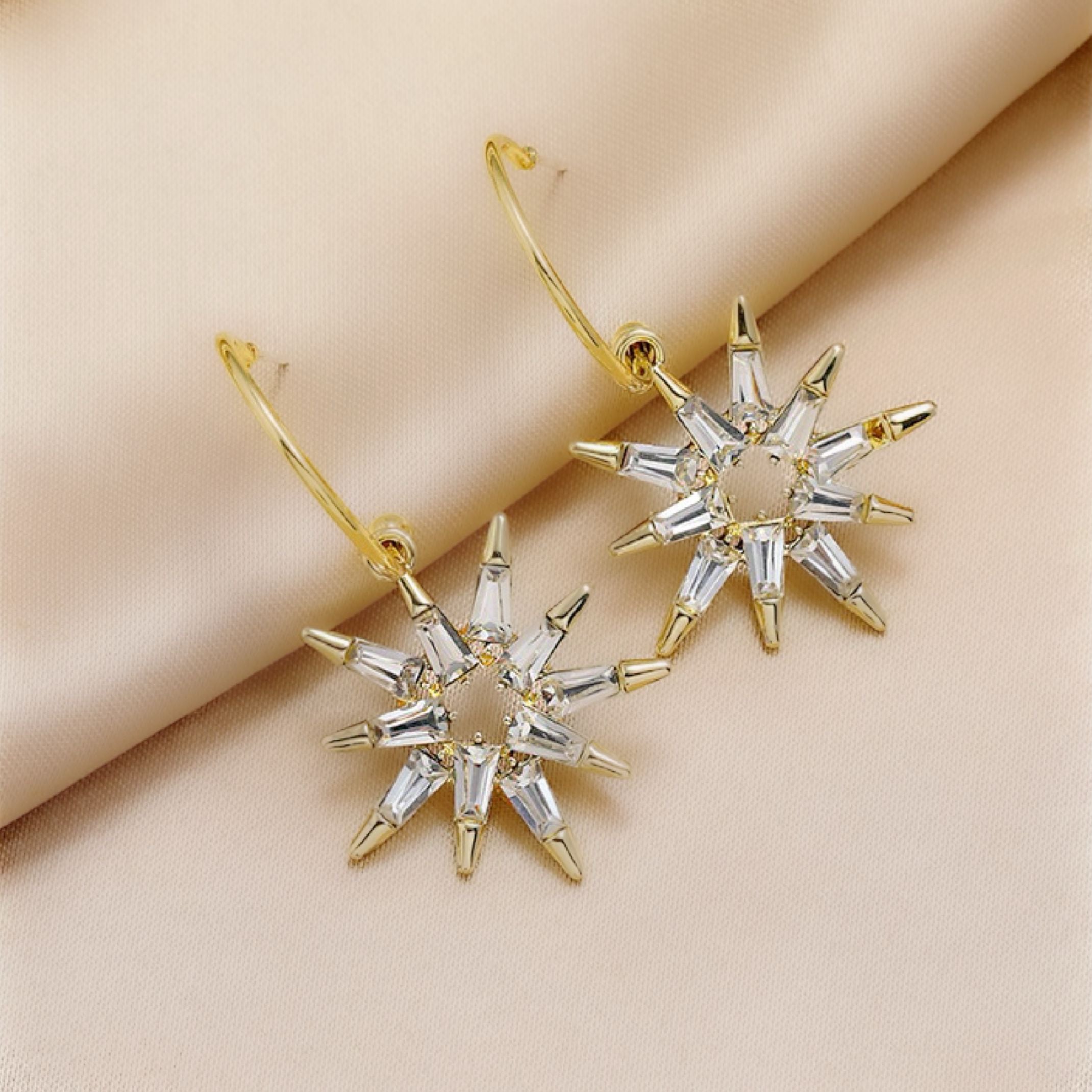 Gold star charm earrings 