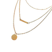 Gold bar and disc layered necklace 