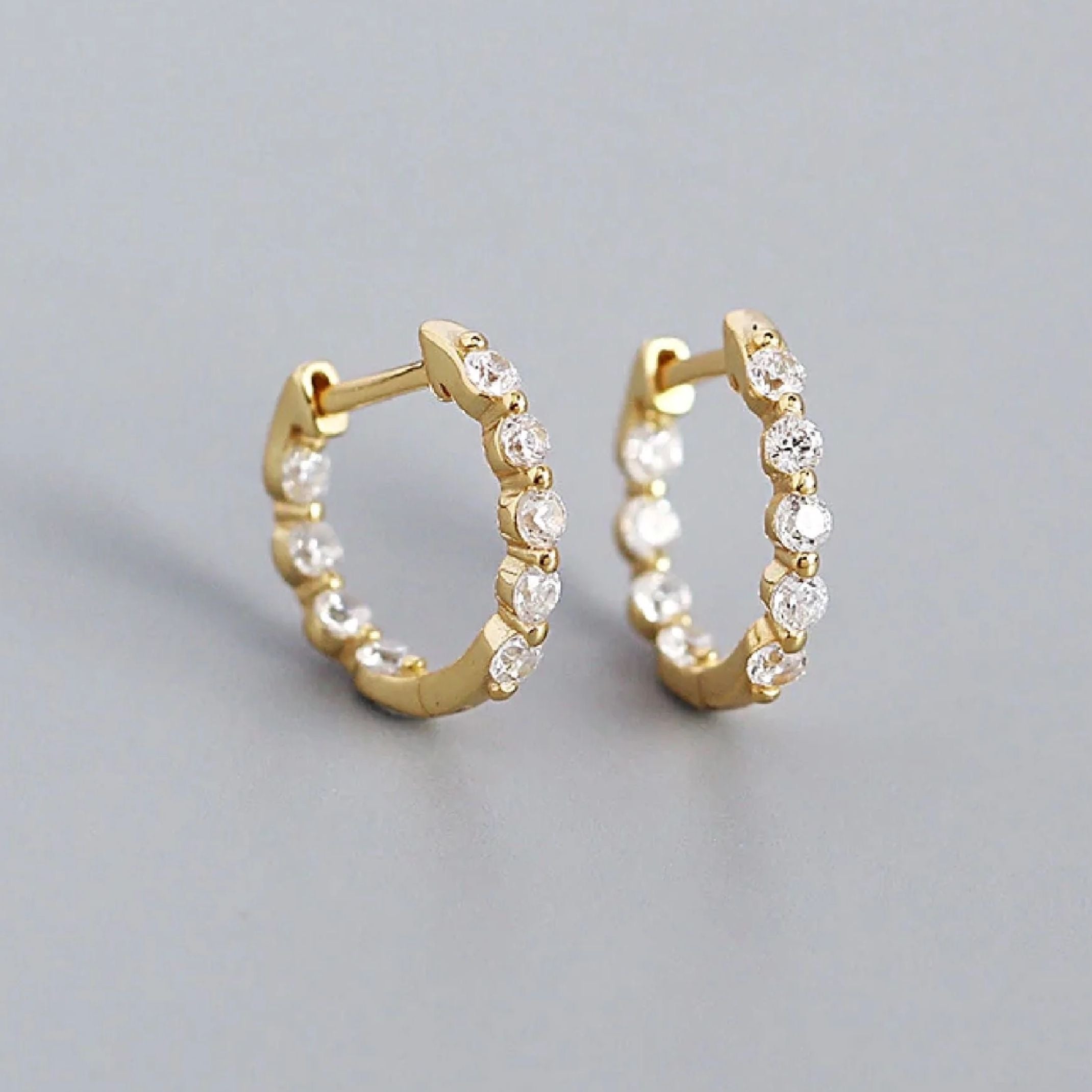 Gold crystal huggie earrings 