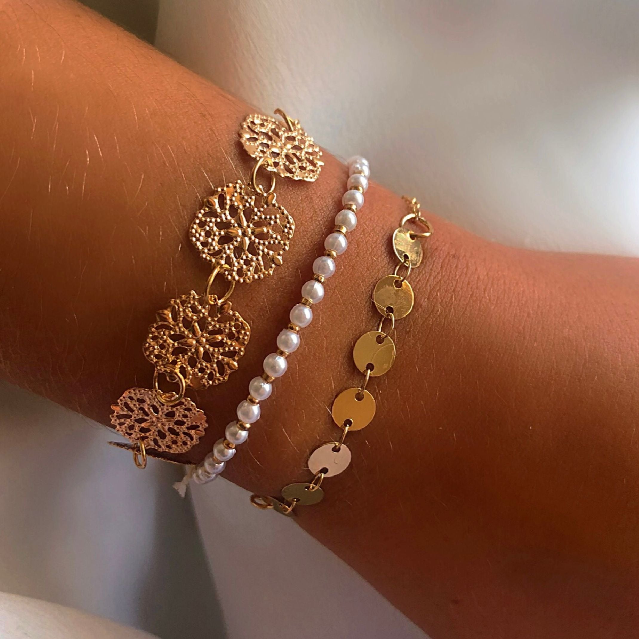 Gold and white bracelet set 