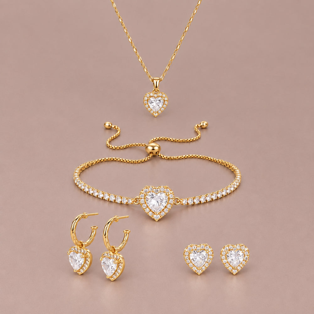 Gold heart necklace, bracelet and earrings with sparkling crystal and cubic zirconia details