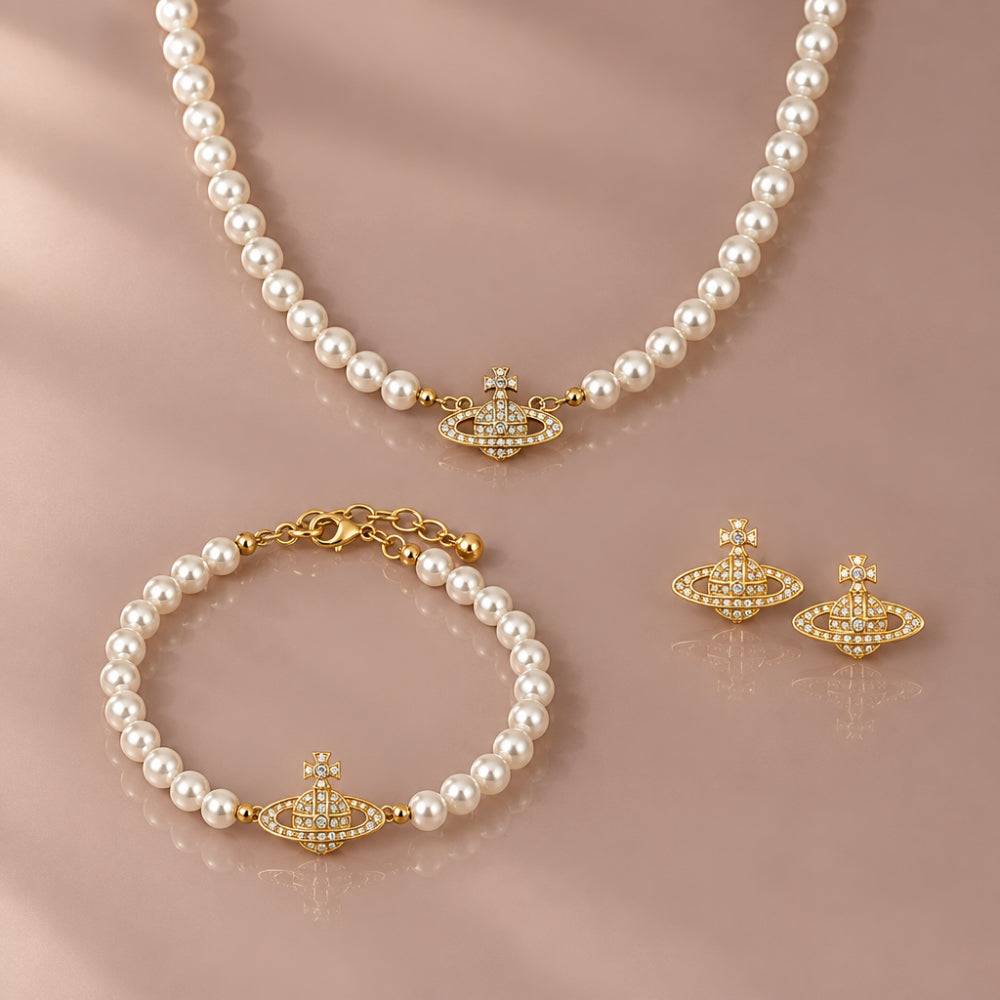 Gold Orb Pearl jewellery with crystal detail necklace and bracelet and gold CZ stud earrings.