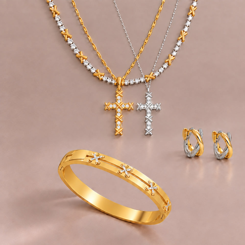 Gold plated XO tennis necklace, cross necklace and sparkling bangle with signature X details, alongside two-tone X huggie earrings