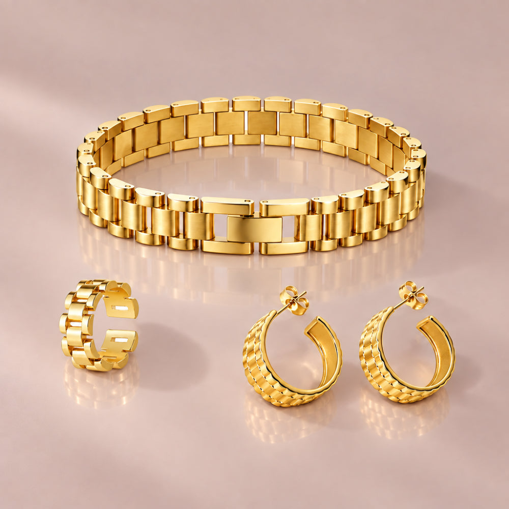 Gold watch strap jewellery set with link bracelet, adjustable ring and textured hoop earrings. 