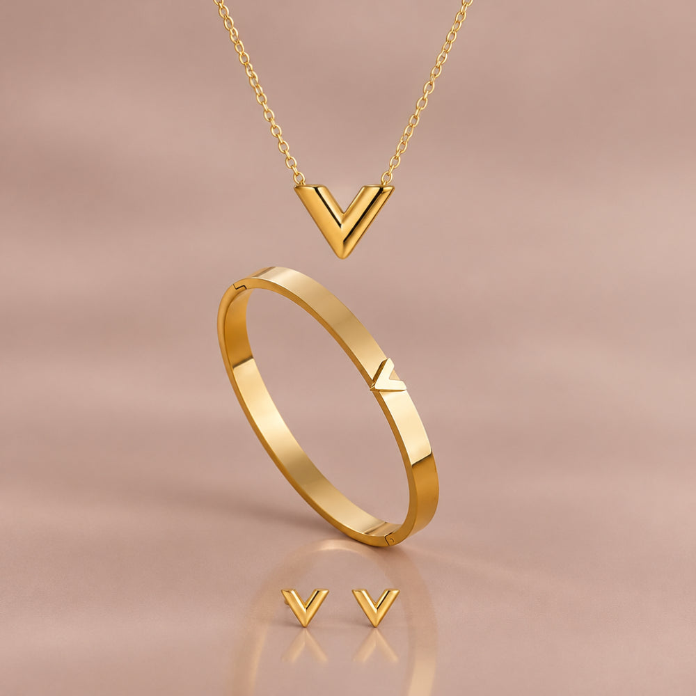 Gold plated V pendant necklace, hinged bangle and matching V stud earrings 