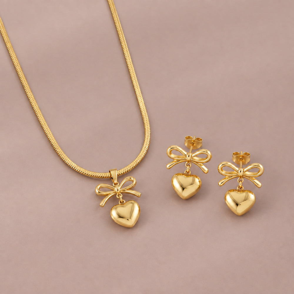 Gold plated bow heart necklace and matching bow and heart drop earrings 