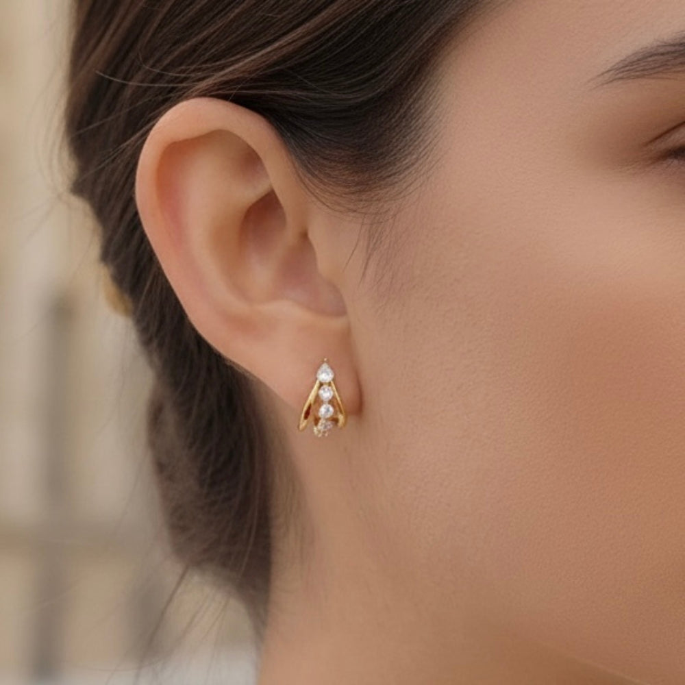 Dainty gold hoop earrings with crystals 