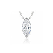 A silver pendant necklace featuring a marquise-cut clear gemstone in a prong setting, suspended from a delicate silver chain against a white background with a soft reflection below.