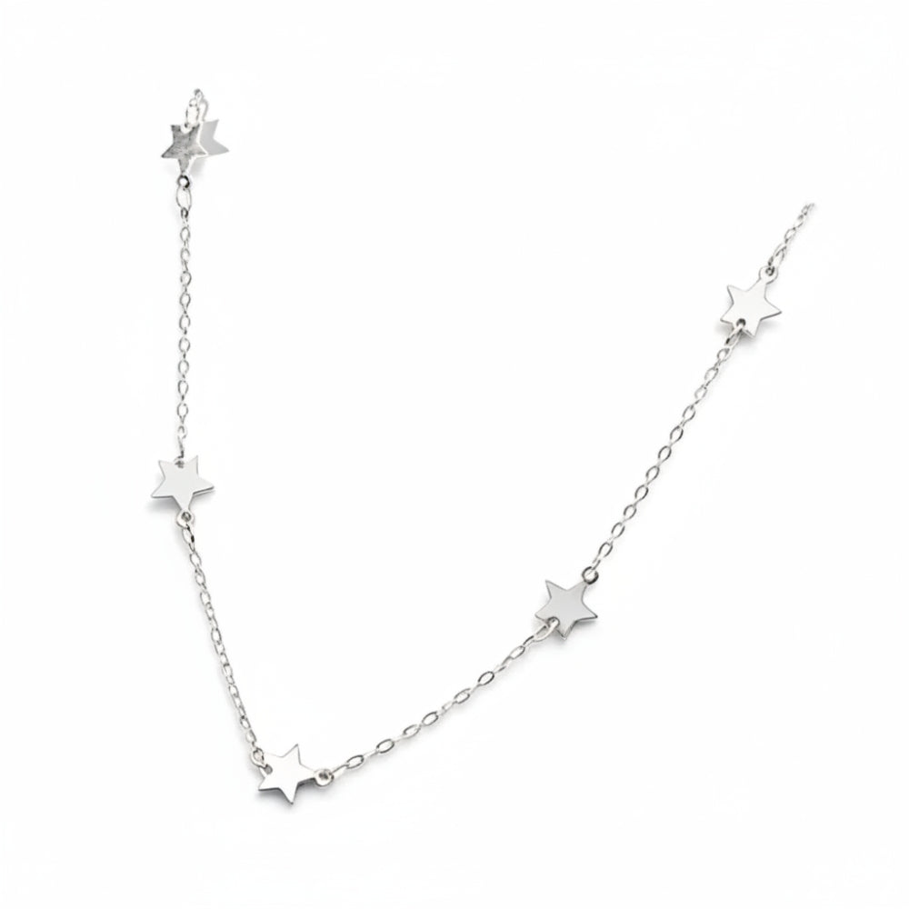 A delicate silver chain necklace featuring five small, evenly spaced star charms on a plain white background.