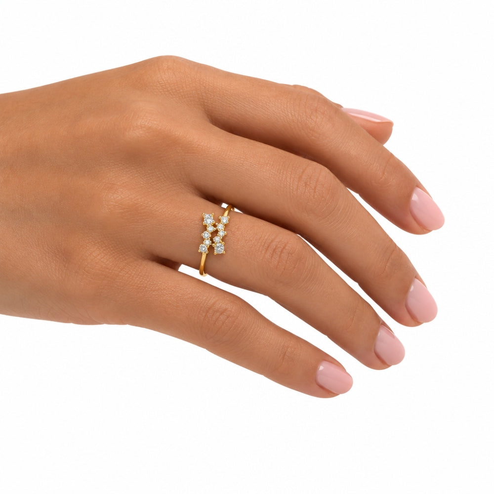 Delicate gold band ring with a cluster of crystal stones 