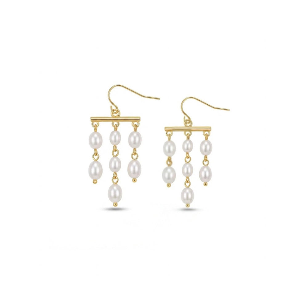 A pair of gold dangle earrings with white pearl beads, shown against a plain white background.