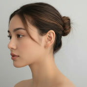 Gold Star Huggie Earrings