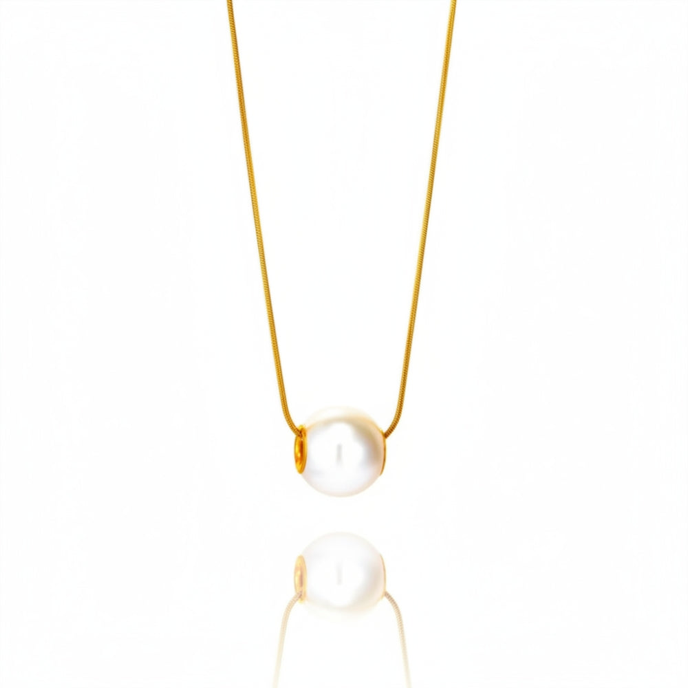 A delicate gold chain necklace featuring a single white freshwater pearl pendant, shown against a clean white background with a soft reflection below.