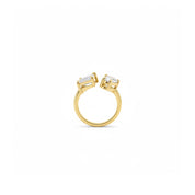 A yellow gold ring with two baguette-cut clear gemstones in a prong setting, shown against a plain white background.