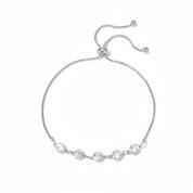 A silver adjustable slide chain bracelet featuring five clear round-cut gemstones set in a row on the front, displayed against a solid white background.